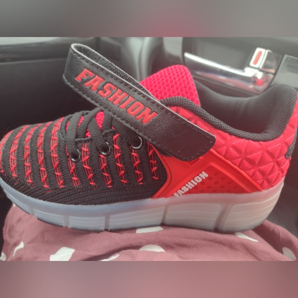 New without tags Red wheeled sneakers